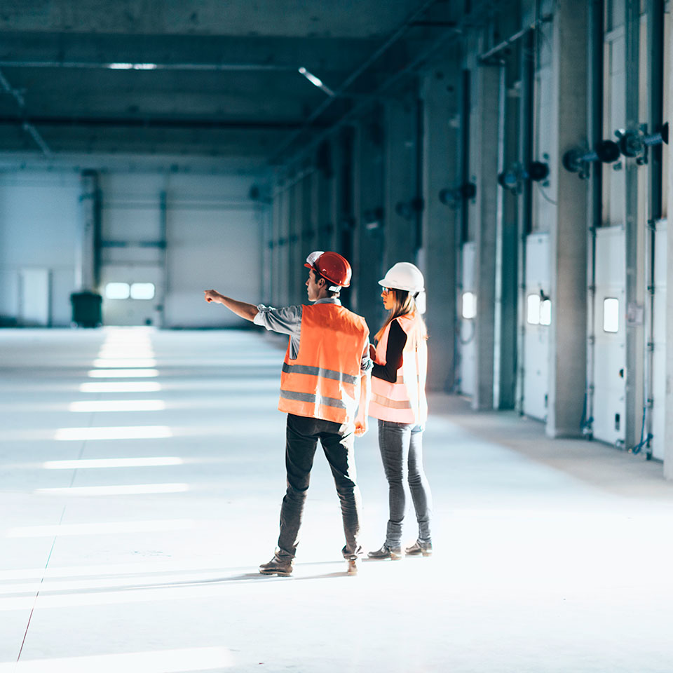 Engineers planning concrete maintenance